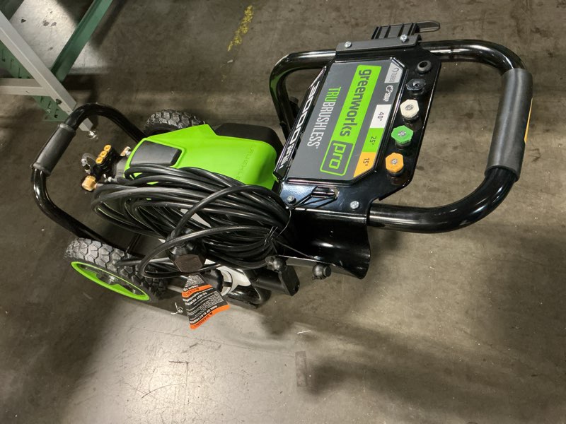 Condition photo showing As Is for greenworks 3000 psi (2.0 gpm max) brushless electric pressure washer, steel wand, on-board soap tank (15°, 25°, 40°, soap, and turbo nozzle)