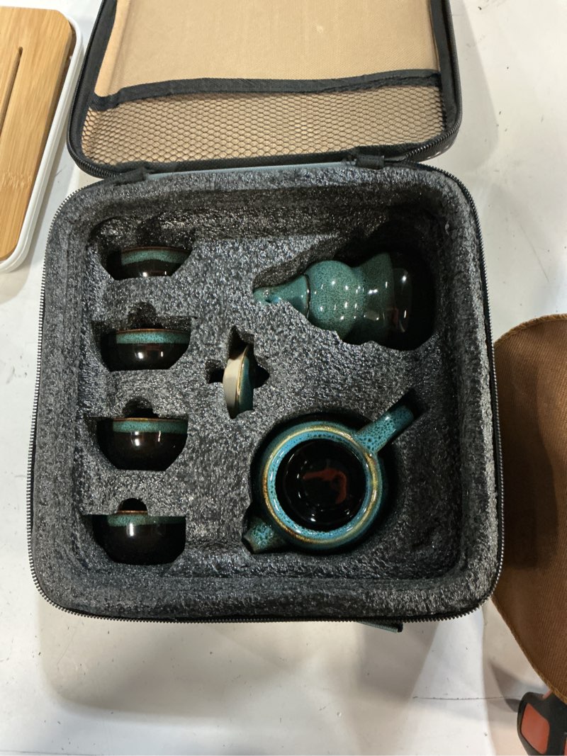 Condition photo showing Good Condition for chinese tea set portable travel,japanese teaset,handmade kungfu tea set with teapot,teacups,tea canister,bamboo tea tray with a portable travel bag(kiln change)