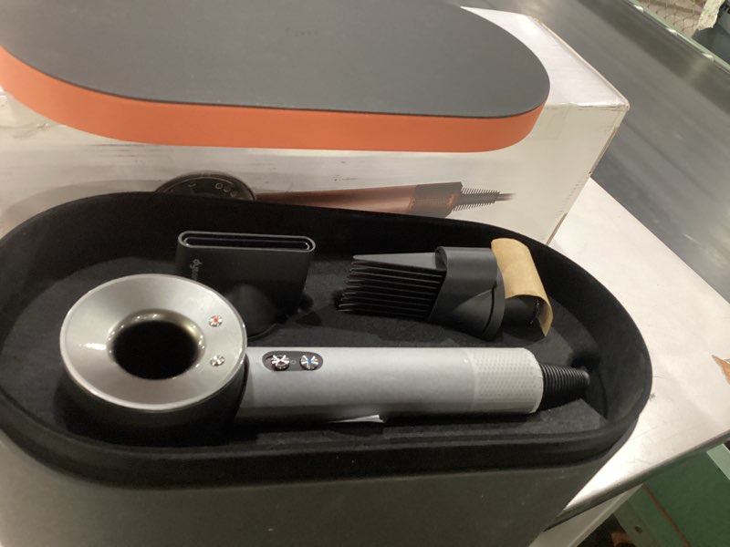 Condition photo showing As Is for not tested dyson supersonic nural™ hair dryer amber silk