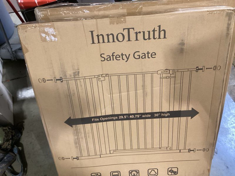 Condition photo showing New/Like New for innotruth 29.5–40.75" baby gate for stairs, 30" tall dog gates for doorways & hallways, safety gate for kids & pets, pressure-mounted walk-through with dual lock & 2-way swing, black black 29.5-40.75" w x 30" h