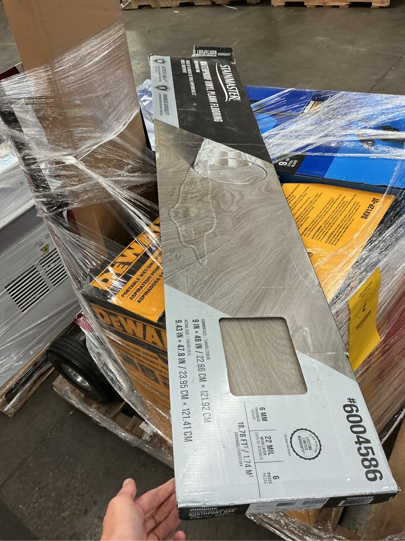 Condition photo showing New/Like New for stainmaster northport oak gray wood look 22-mil x 9-in w x 47-in l waterproof and water resistant interlocking luxury vinyl plank flooring ( 18.78-sq ft carton )
