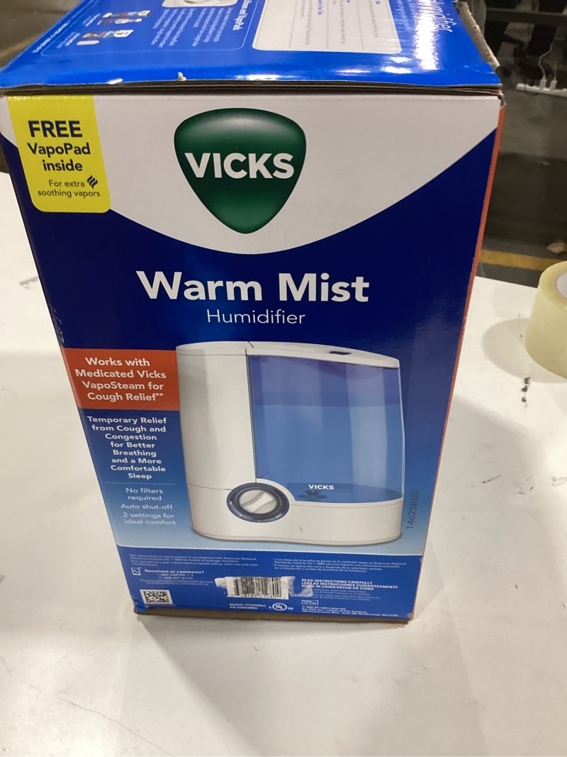 Condition photo showing New/Like New for Warm mist