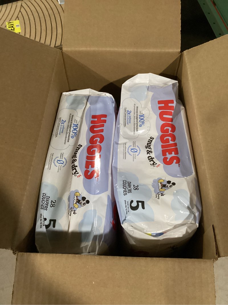 Condition photo showing Good Condition for (Only two packs)Huggies Size 5 Diapers, Snug & Dry Baby Diapers, Size 5 (27+ lbs), 168 Count (6 Packs of 28), Packaging May Vary Size 5 168