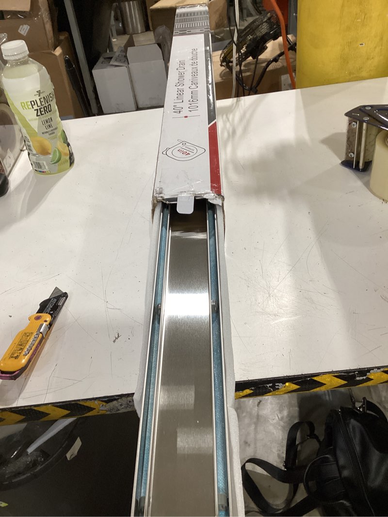 Condition photo showing New/Like New for neodrain 40-inch linear shower drain with tile insert grate, brushed 304 stainless steel rectangle shower floor drain, linear drain with leveling feet, hair strainer