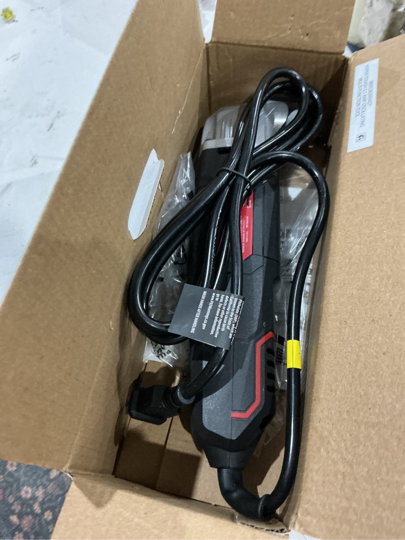 Condition photo showing As Is for hyper tough 2.1 amp new condition corded oscillating multi-function tool, variable speed, with hex key, sanding pad, quarter inch blade, scraper blade & 3 sanding sheets