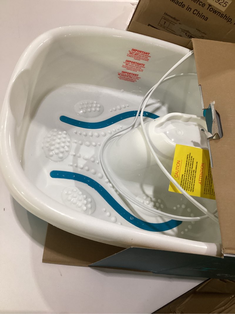 Condition photo showing As Is for homedics bubble mate foot spa, toe touch controlled foot bath with invigorating bubbles and splash proof, raised massage nodes and removable pumice stone, not tested, used