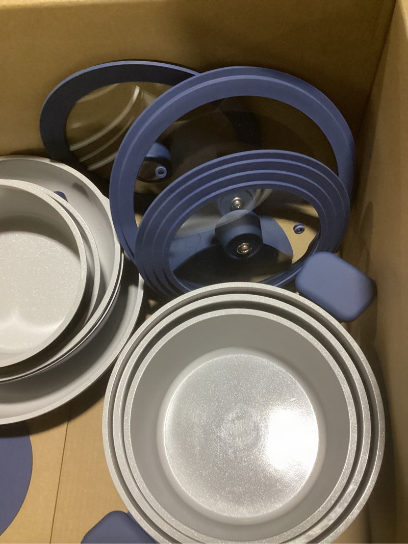 Condition photo showing As Is for CAROTE 27pcs Ceramic Cookware Set Nonstick, Pots and Pans Set Non stick, Non Toxic Cookware, Dishwasher/Oven Safe, RV/Camping Cookware Set, Pan and Pot with Kitchen Utensils, Navy Blue 27 Piece Navy