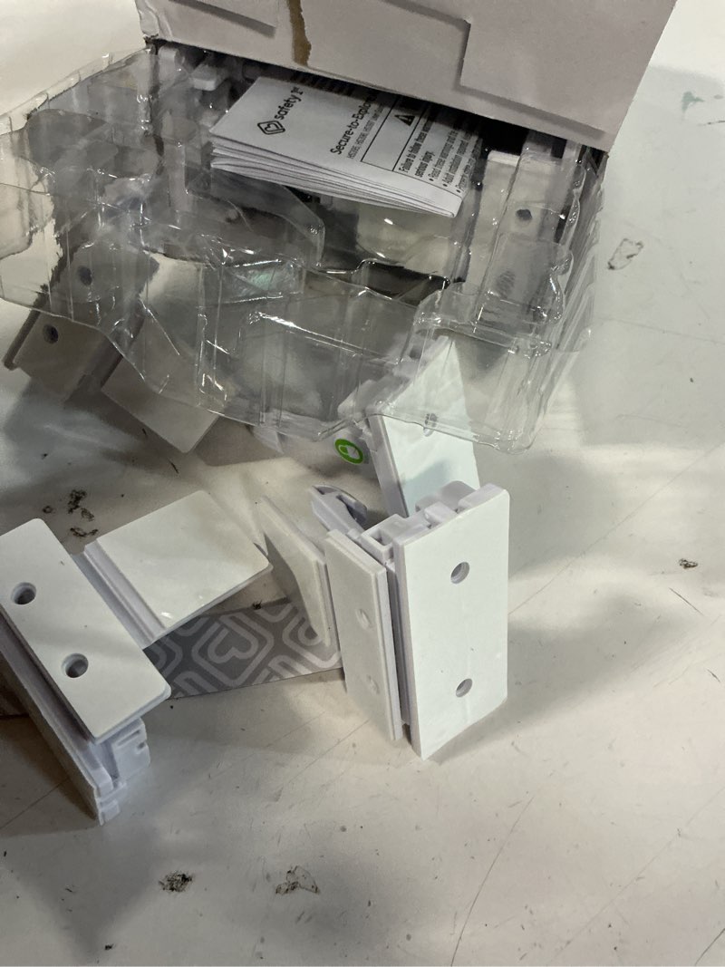 Condition photo showing As Is for safety 1st secure-to-explore adhesive locks set