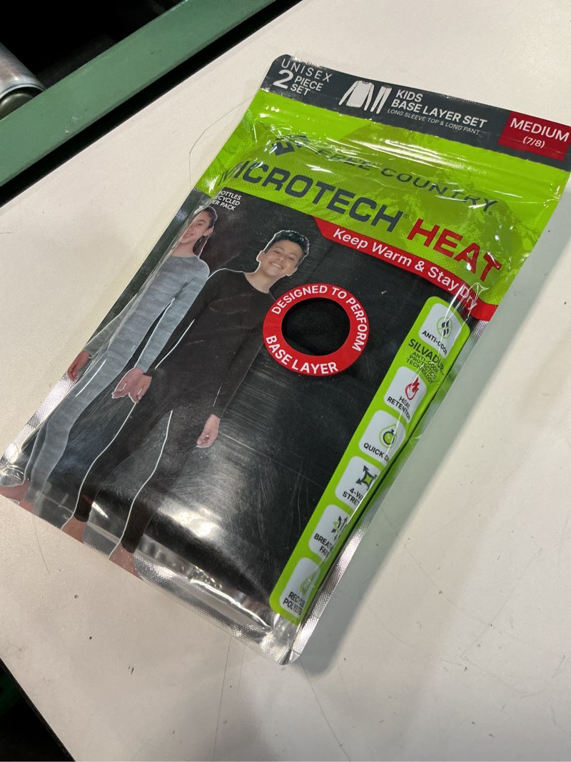 Condition photo showing Good Condition for kids' microtech® heat base layer set (medium size) 