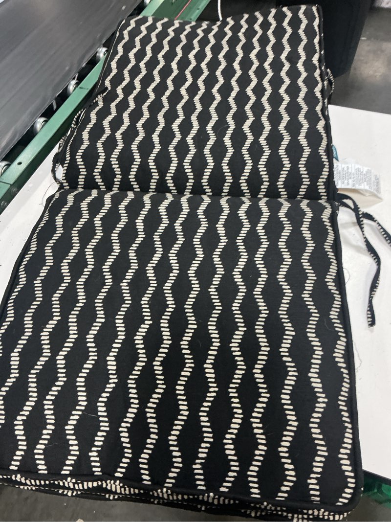 Condition photo showing As Is for origin 21 20-in x 20-in black helix jacquard high back patio chair cushion