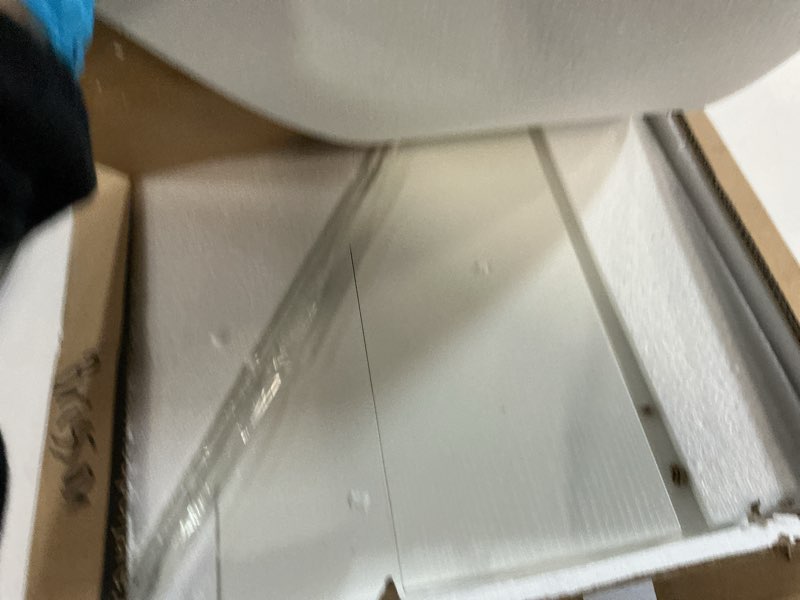 Condition photo showing Good Condition for SUPERJARE Kitchen Bakers Rack with Power Outlet, Coffee Bar Table 4 Tiers, Kitchen Microwave Stand with 6 S-Shaped Hooks, Storage Shelf Rack for Spices, Pots and Pans - White 23.6 inch White