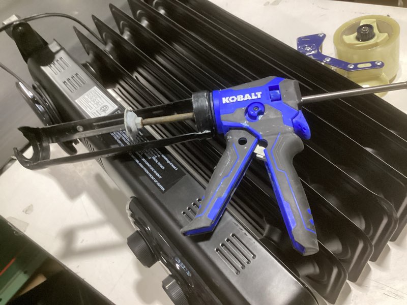 Condition photo showing As Is for WORKPRO Caulking Gun, Adjustable Hand Caulk gun, Less-dripping Regulating, Sealant Silicone Gun with Comfort Grip, 9:1 & 18:1 Thrust Ratio, Smooth Round Rod for 10oz Caulk tubes