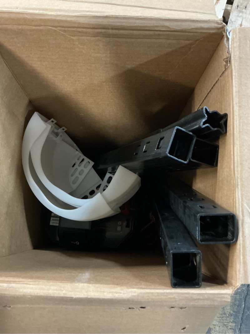 Condition photo showing As Is for chamberlain 3/4 hp belt drive smart garage door opener with fixed camera, battery backup, 2-bulb lighting, and myq connectivity