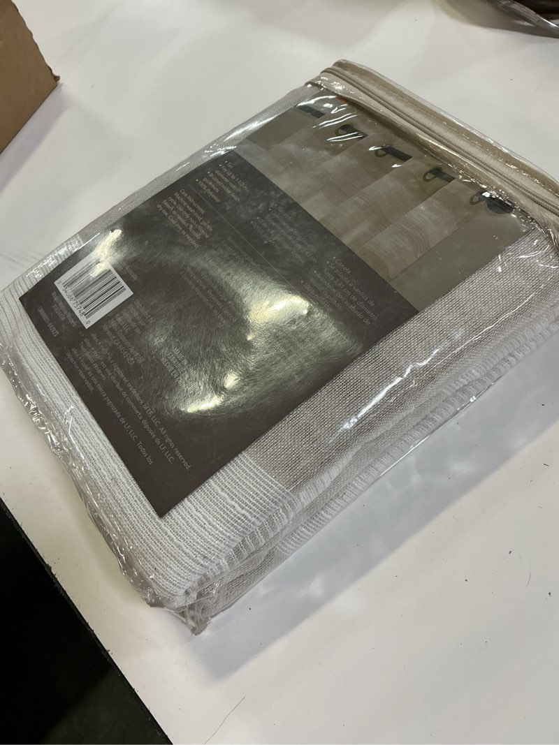 Condition photo showing New/Like New for allen + roth 84-in tan polyester semi-sheer grommet single curtain panel