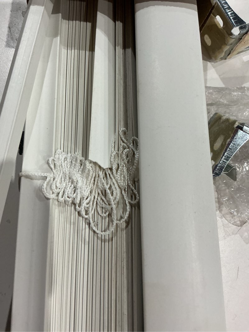 Condition photo showing As Is for (cracked)calyx interiors room darkening vinyl mini blinds, cordless, 1\\\" slat, 22.5\\\" w x 48\\\" h, white