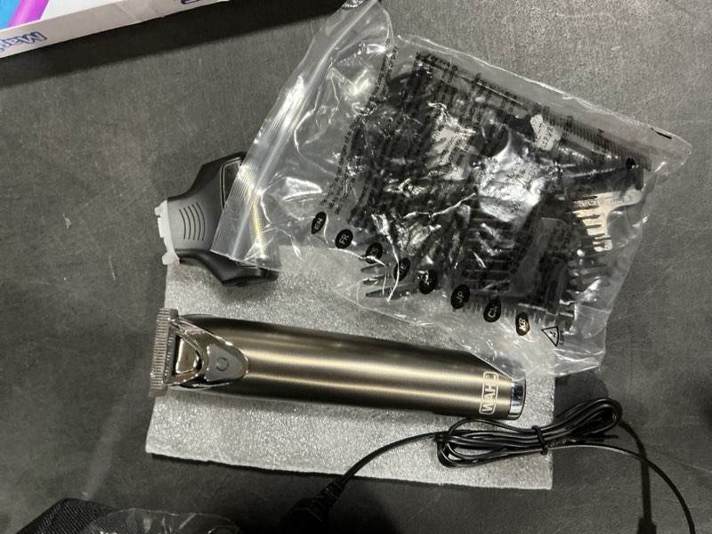 Condition photo showing item condition for (Similar too) WAHL USA Stainless Steel Lithium Ion 2.0+ Slate Beard Trimmer for Men - Electric Shaver, Nose Ear Trimmer, Rechargeable All in One Men's Grooming Kit - Model 9864 23 Piece Set