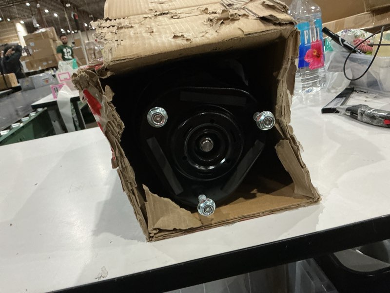Condition photo showing As Is for similar to not exact apremium strut coil sprimg assembly