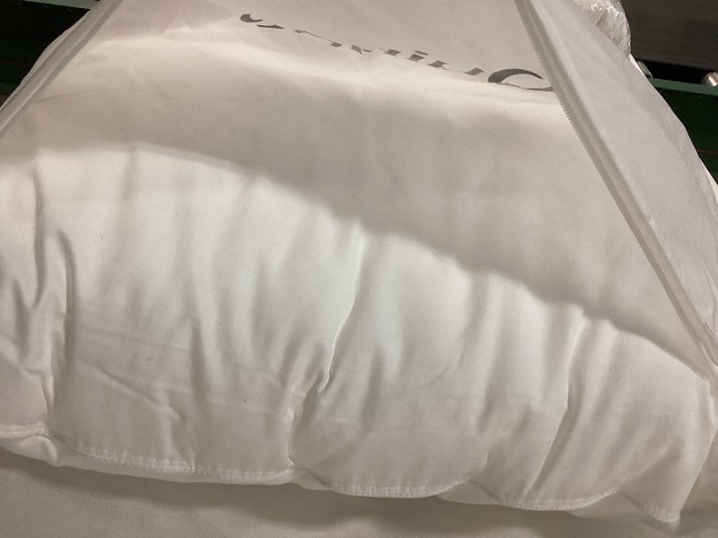 Condition photo showing As Is for quince premium down alt pillow standard medium firm