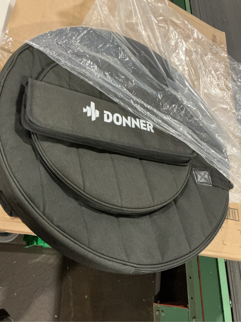 Condition photo showing Good Condition for donner cymbal bag with drumstick bag, cymbal backpack with handle and hideable dual shoulder straps, holds 6 cymbals and 6 drum sticks, fits ride up to 24 inch