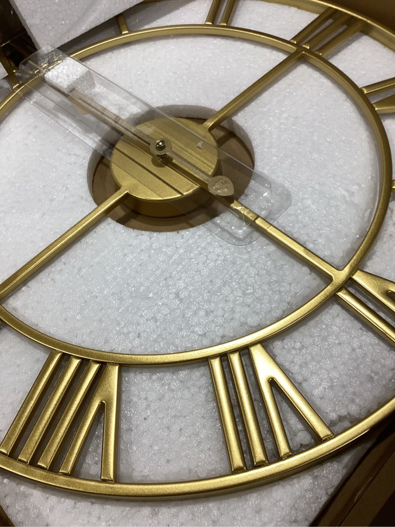 Condition photo showing Good Condition for LEIKE Large Modern Wall Clocks,18" Gold Metal,Rustic,Round,Silent Non Ticking,Battery Operated Roman Numerals Clock for Living Room/Bedroom/Kitchen Wall Decor-(Gold, 47cm) 19 Inch Gold-roman Number