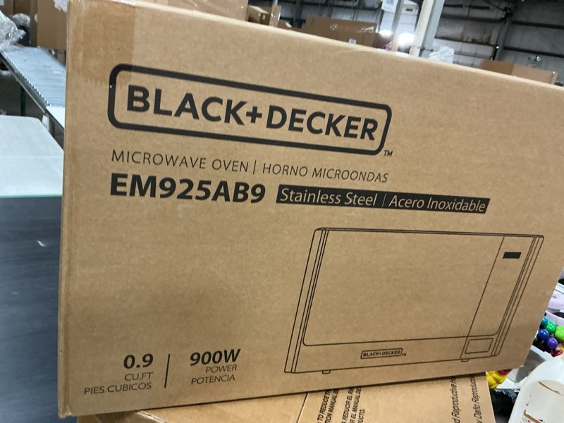 Condition photo showing New/Like New for BLACK+DECKER Digital Microwave Oven with Turntable Push-Button Door, Child Safety Lock, Stainless Steel, 0.9 Cu Ft 0.9 Cu.Ft