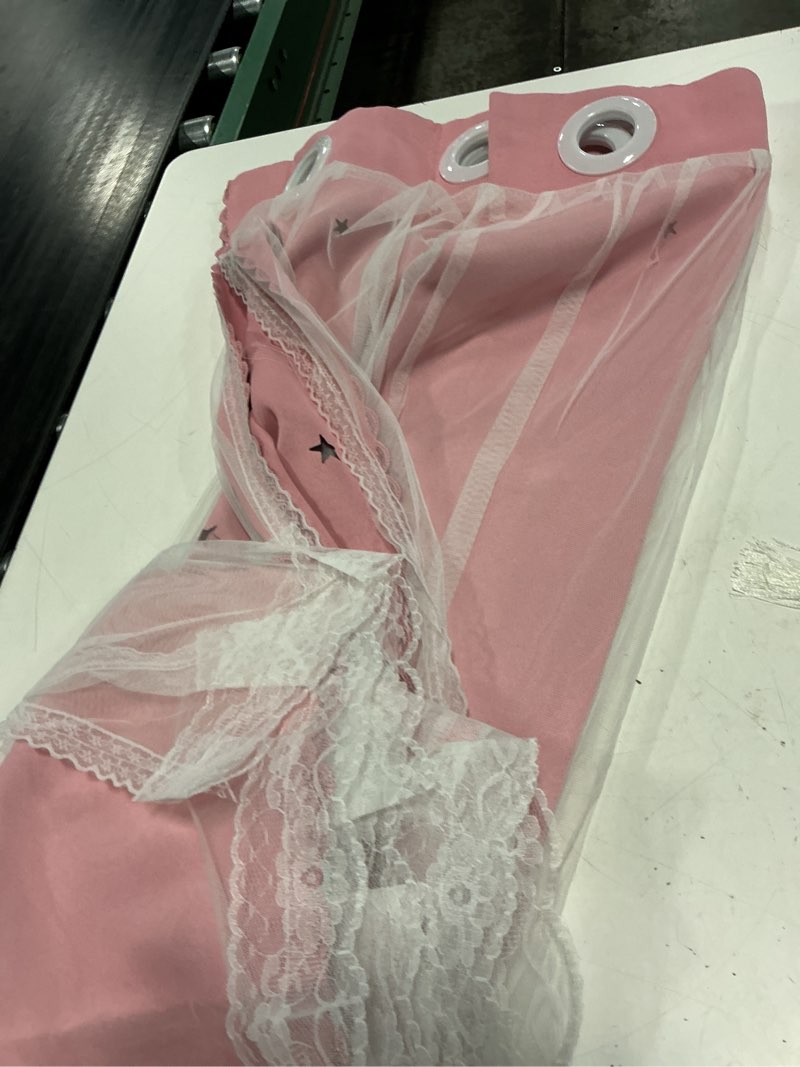 Condition photo showing Good Condition for blackout curtain with tulle overlay and cut-out stars – single curtain panel (52x63”)