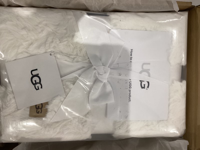 Condition photo showing New/Like New for UGG Adalee Faux Fur Throw Blanket Luxury Lightweight Cozy Soft Throw for Couch Bed or Chair Hypoallergenic Machine Washable Double-Sided Fluffy Blanket Home Decor, 50-inch x 70-inch, Natural White White Throw