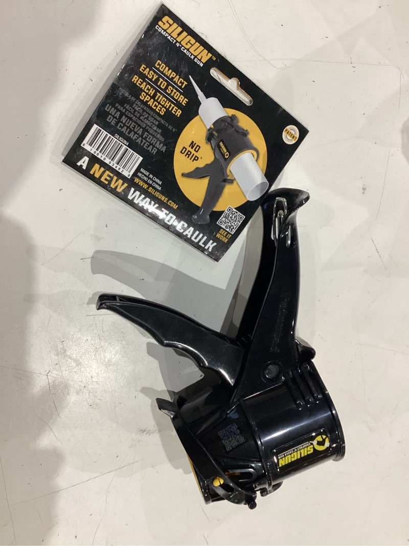 Condition photo showing As Is for siligun professional plastic drip free caulking gun