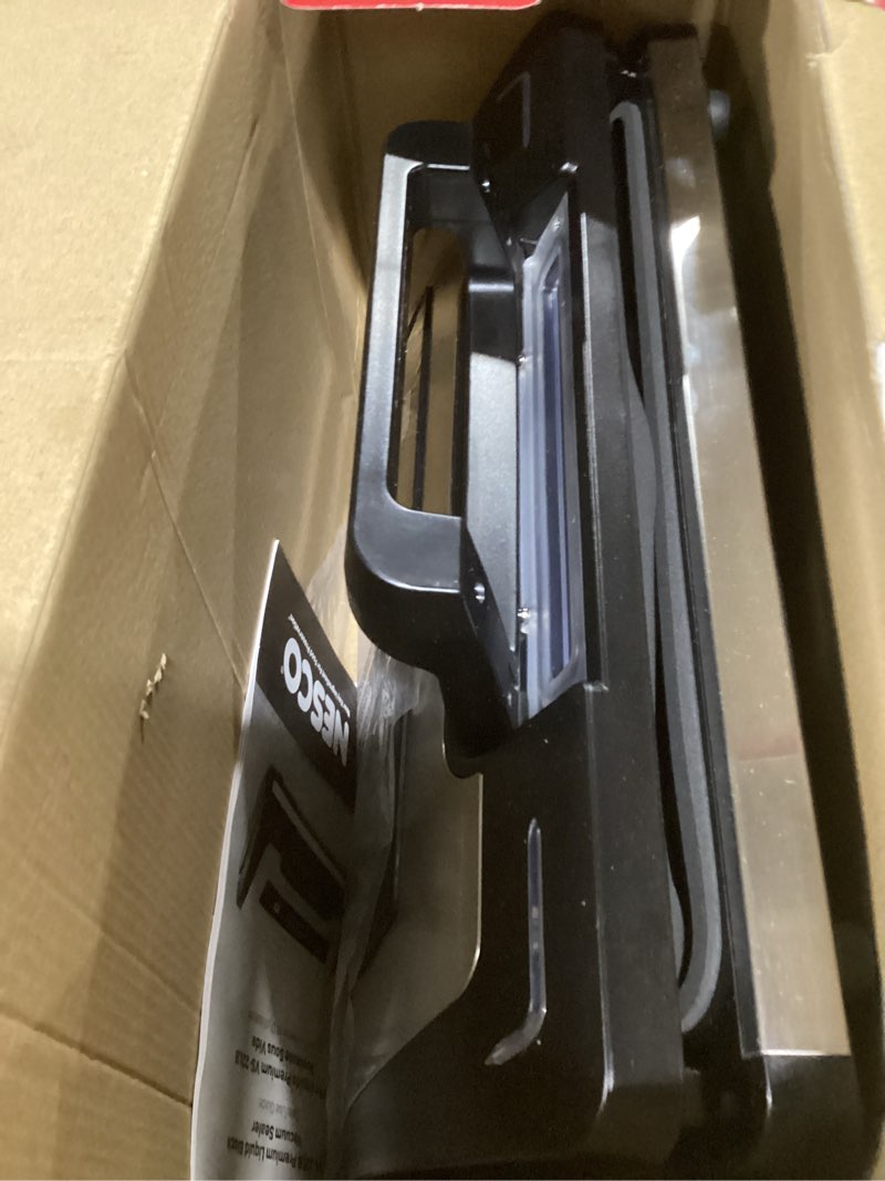 Condition photo showing As Is for Nesco Premium Vacuum Sealer Kit featuring LiquidLock™, Includes large variety of Bags and Rolls VS-22LB, Built-in Canister Sealing Function