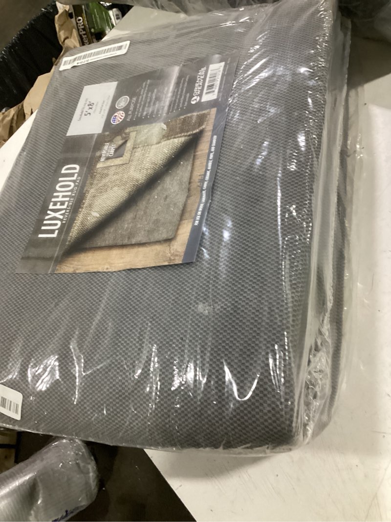 Condition photo showing Good Condition for deluxe all-surface non-skid area rug pad for 5-feet by 8-feet rug