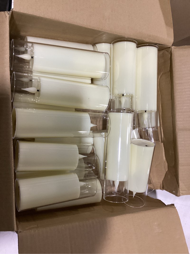 Condition photo showing As Is for 24 pack led flameless candles set(14/16/18cm), battery - operated with 4 remotes,clear, timer & flickering/steady modes for home décor, wedding, patio,outdoor. (only 20)
