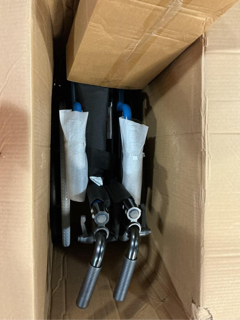 Condition photo showing New/Like New for medline pediatric wheelchair with 12" wide nylon seat with seat belt, 250 lb. weight capacity, telescoping handles, swing-back desk-length arms, swing-away footrests & vibrant blue frame 12" wide seat