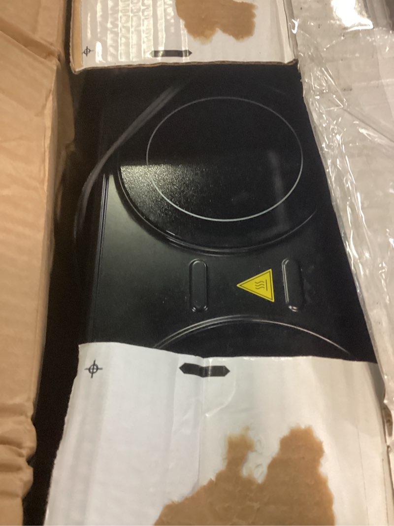 Condition photo showing As Is for OVENTE BGI102B Countertop Infrared Double Burner, 1700W Electric Hot Plate and Portable Stove with 7.75" and 6.75" Ceramic Glass Cooktop, 5 Level Temperature Setting and Easy to Clean Base, Black