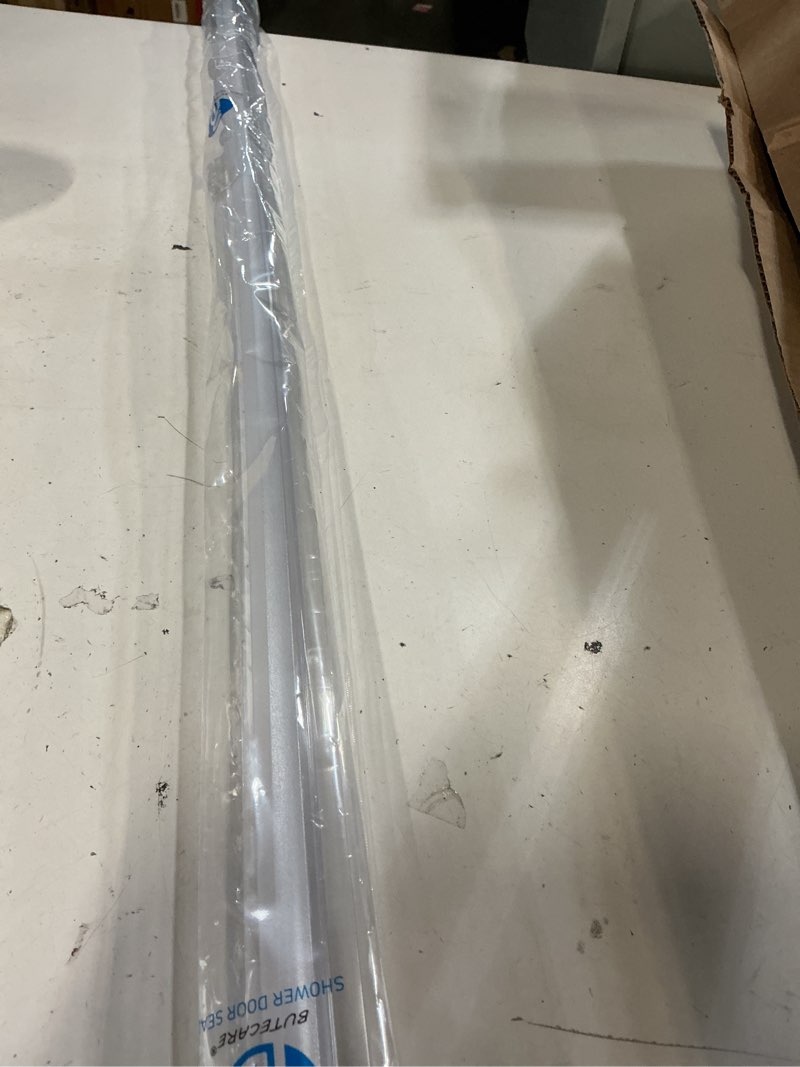 Condition photo showing New/Like New for premium frameless shower door bottom seal strip for glass doors - shower door seal sweep (1/2” x 39”, clear vinyl) 1/2”x 39”