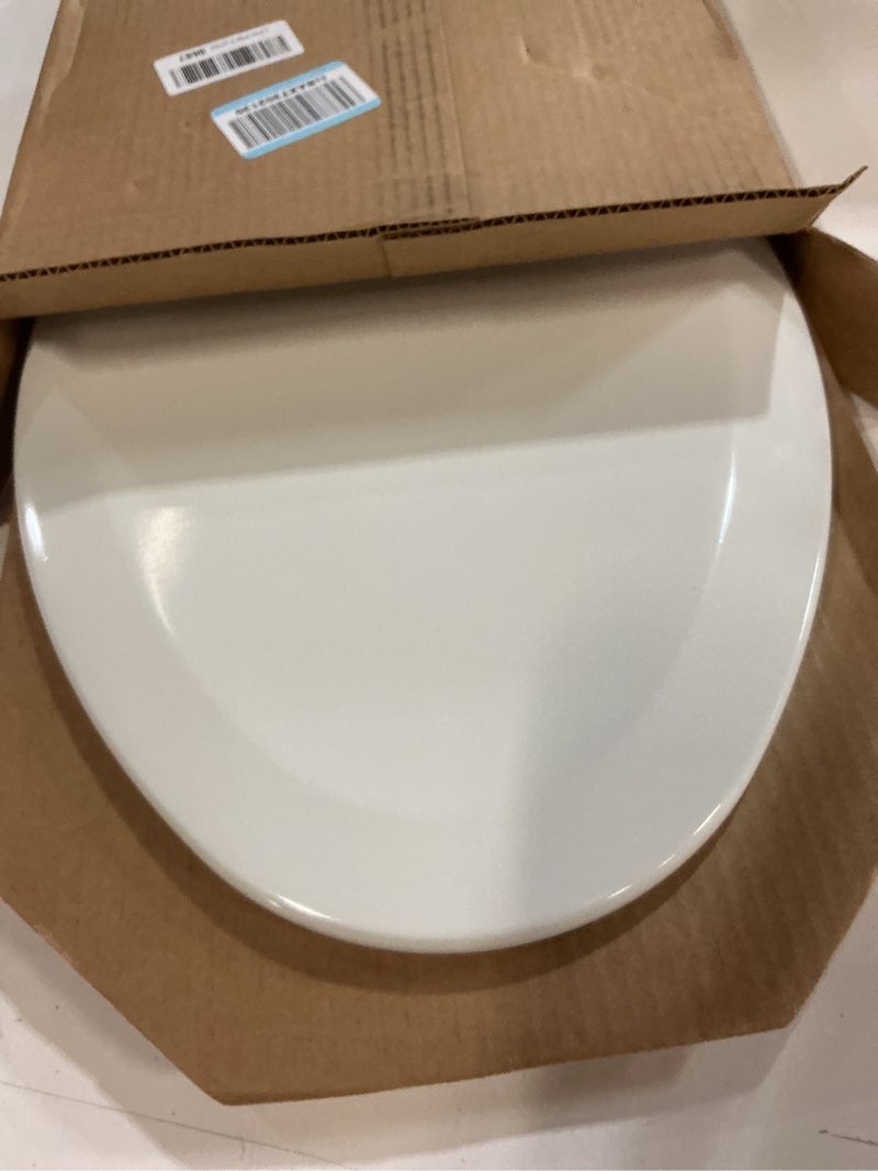 Condition photo showing New/Like New for mayfair linden slow close toilet seat, non slip heavy duty wood, easy install, elongated, white elongated traditional hinge