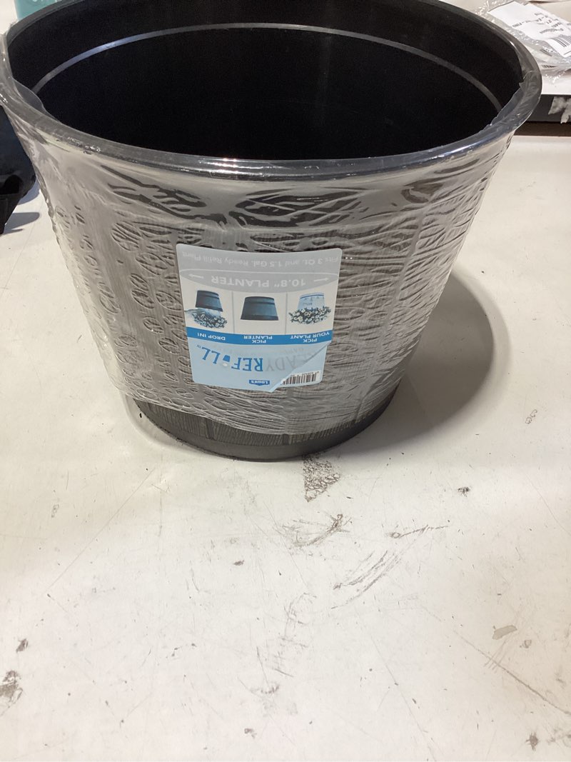 Condition photo showing As Is for style selections round 11.14-inches w medium brown recycled plastic indoor/outdoor planter with drainage holes