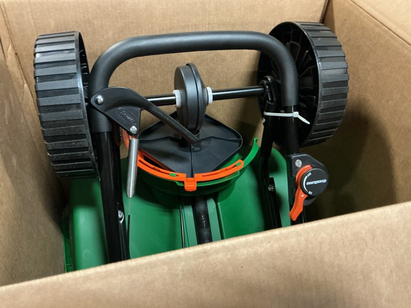 Condition photo showing Good Condition for scotts turf builder edgeguard dlx broadcast spreader - spreader for lawn fertilizer, weed & insect control, grass seed, and ice melt, holds up to 15,000 sq. ft. of product