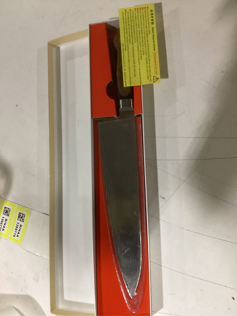 Condition photo showing As Is for stainless steel hi-carbon gyuto by sakai takayuki