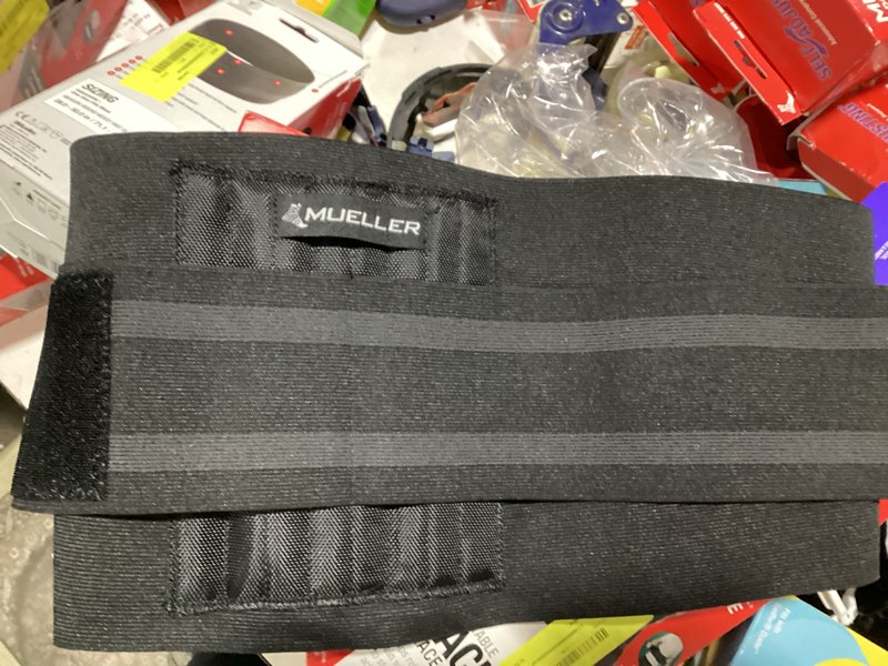 Condition photo showing New/Like New for mueller adjustable back brace, black, one size fits most