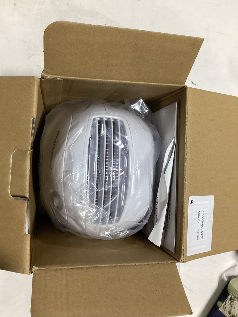 Condition photo showing As Is for pro breeze mini portable dehumidifier, 17oz ultra quiet compact peltier dehumidifier, 215 sqft 1pack