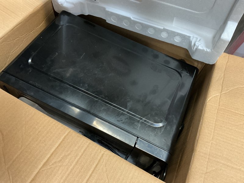 Condition photo showing As Is for FRIGIDAIRE 0.7 Cu. ft. New Countertop Microwave Oven - Black