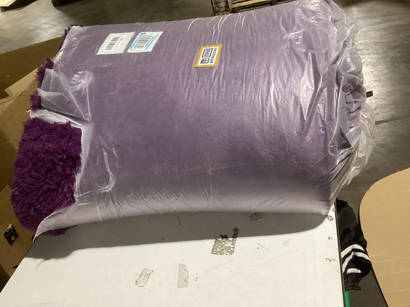 Condition photo showing New/Like New for OLANLY 9x12 Machine Washable Large Area Rugs for Living Room, Bedroom, Soft Fluffy Shaggy Bedside Ru