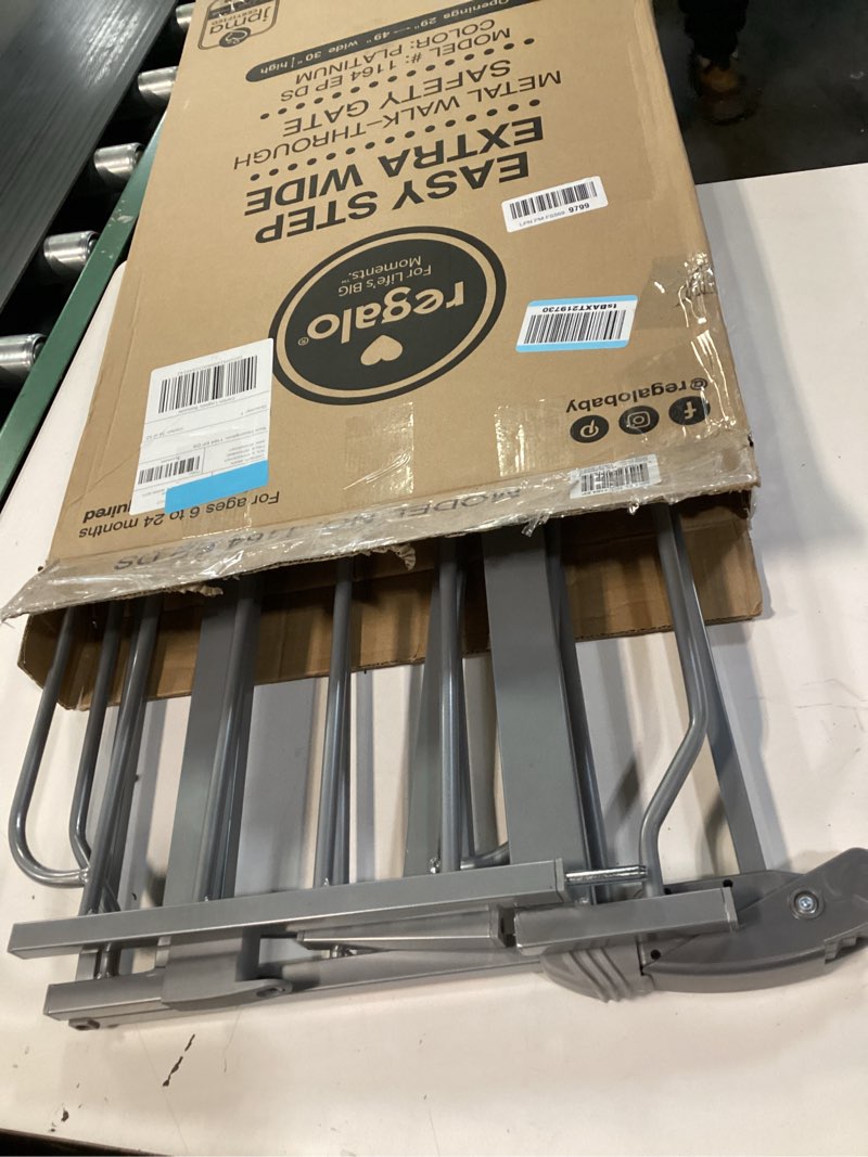 Condition photo showing As Is for Regalo Easy Step 49-Inch Extra Wide Baby Gate, Includes 4-Inch and 12-Inch Extension Kit, 4 Pack of Pressure Mount Kit and 4 Pack of Wall Mount Kit, Platinum Platinum 29-49"W x 30"H