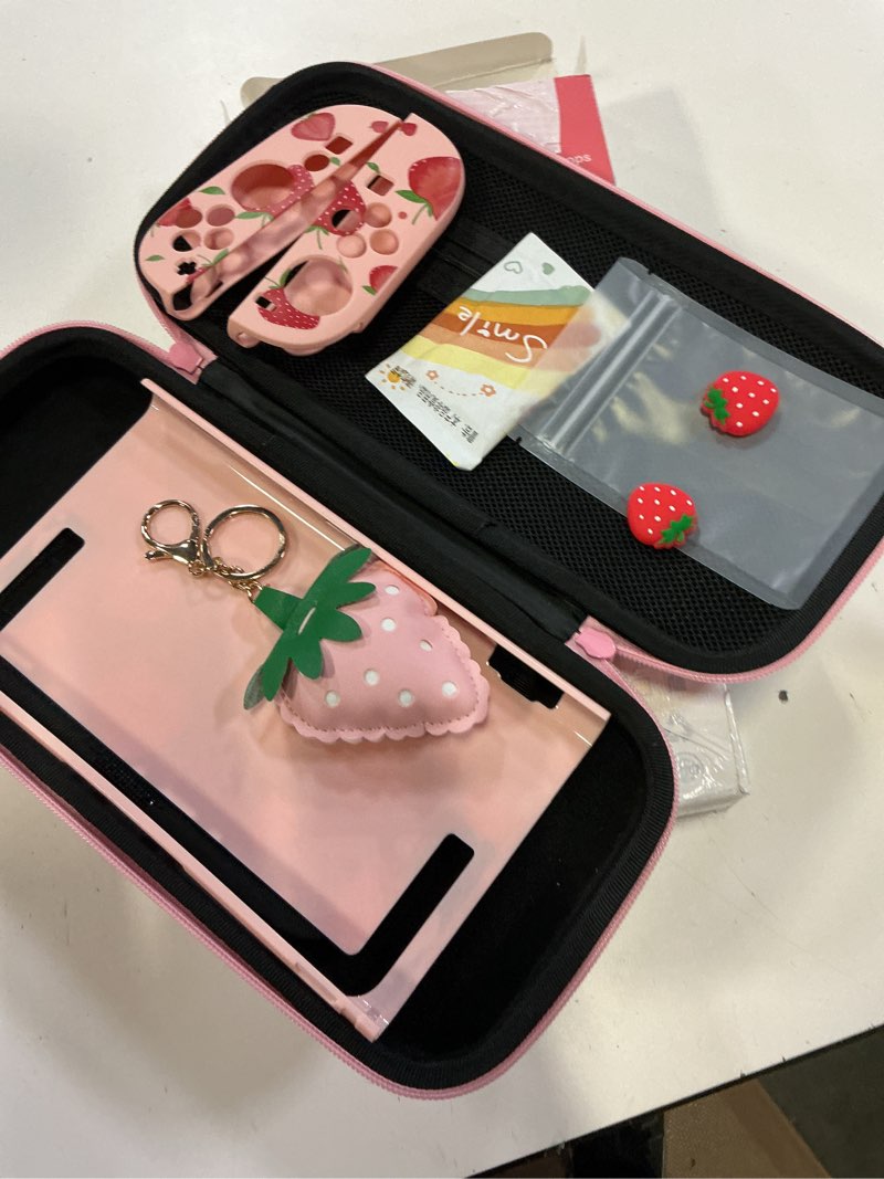 Condition photo showing Good Condition for dlseego storage carrying case for nintendo switch 2 2025 accessories set, 10 game card slots cute protective,1 hard pc case, 1pc decorative pendant, 2 thumb grips, slim & portable,strawberry - pink 2
