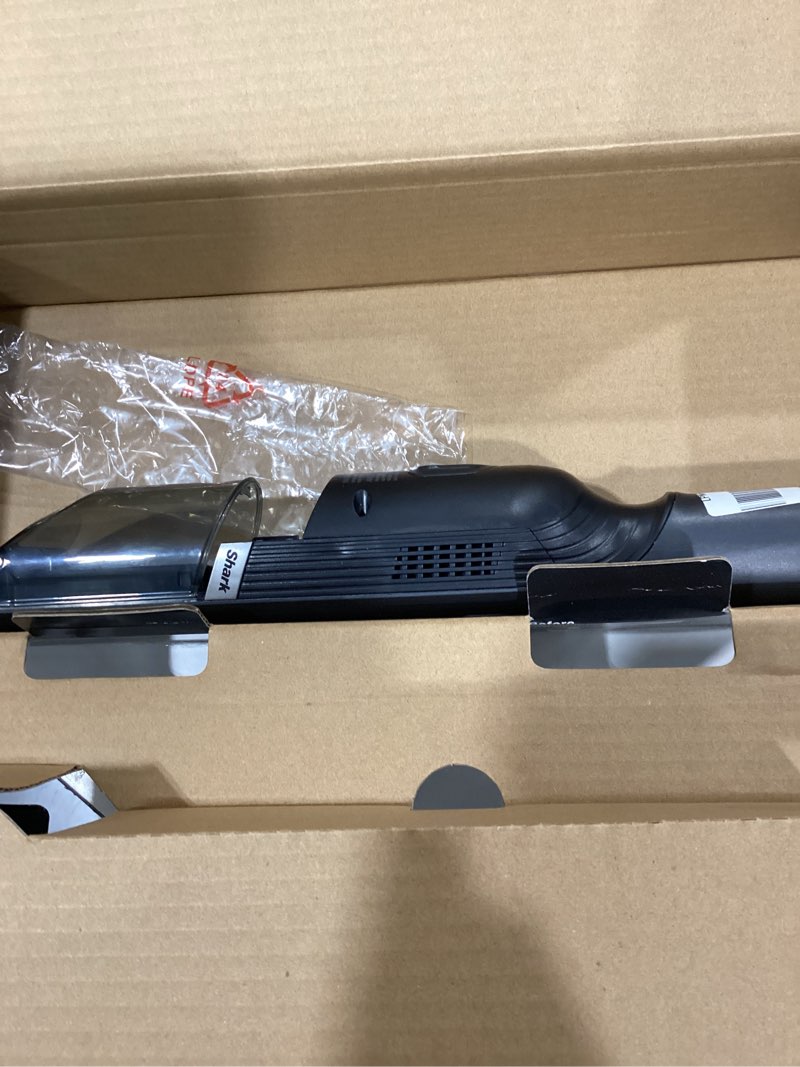 Condition photo showing As Is for Shark WV201 WANDVAC Handheld Vacuum, Lightweight at 1.4 Pounds with Powerful Suction, Charging Dock, Single Touch Empty and Detachable Dust Cup,Graphite, Slate