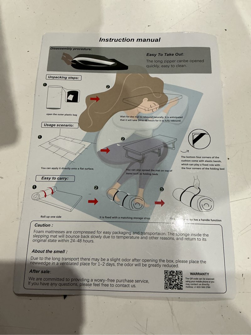 Condition photo showing As Is for roll up mattress pad, black