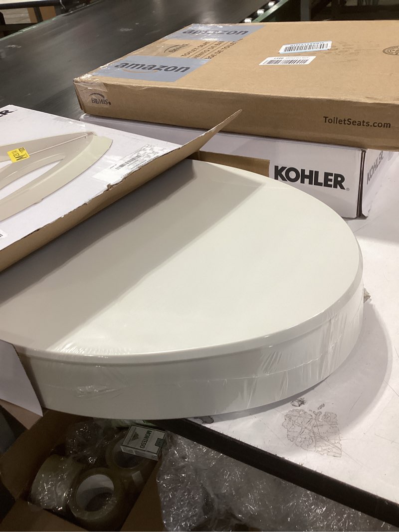 Condition photo showing New/Like New for KOHLER 25875-96 Hyten 3" Height, Elevated Soft Close Elongated Toilet Seat, Contoured Seat with Grip-Tight Bumpers, Quick-Attach Hardware, No Slam Toilet Seat, Biscuit Biscuit Elongated