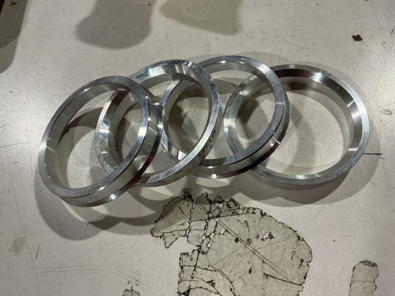 Condition photo showing Good Condition for hubcentric rings (pack of 4) - 57.1mm id to 66.6mm od - silver aluminum hubrings - for 57.1mm hubs and 66.6mm wheels - compatible with audi volkswagen vw bmw chrysler dodge pontiac