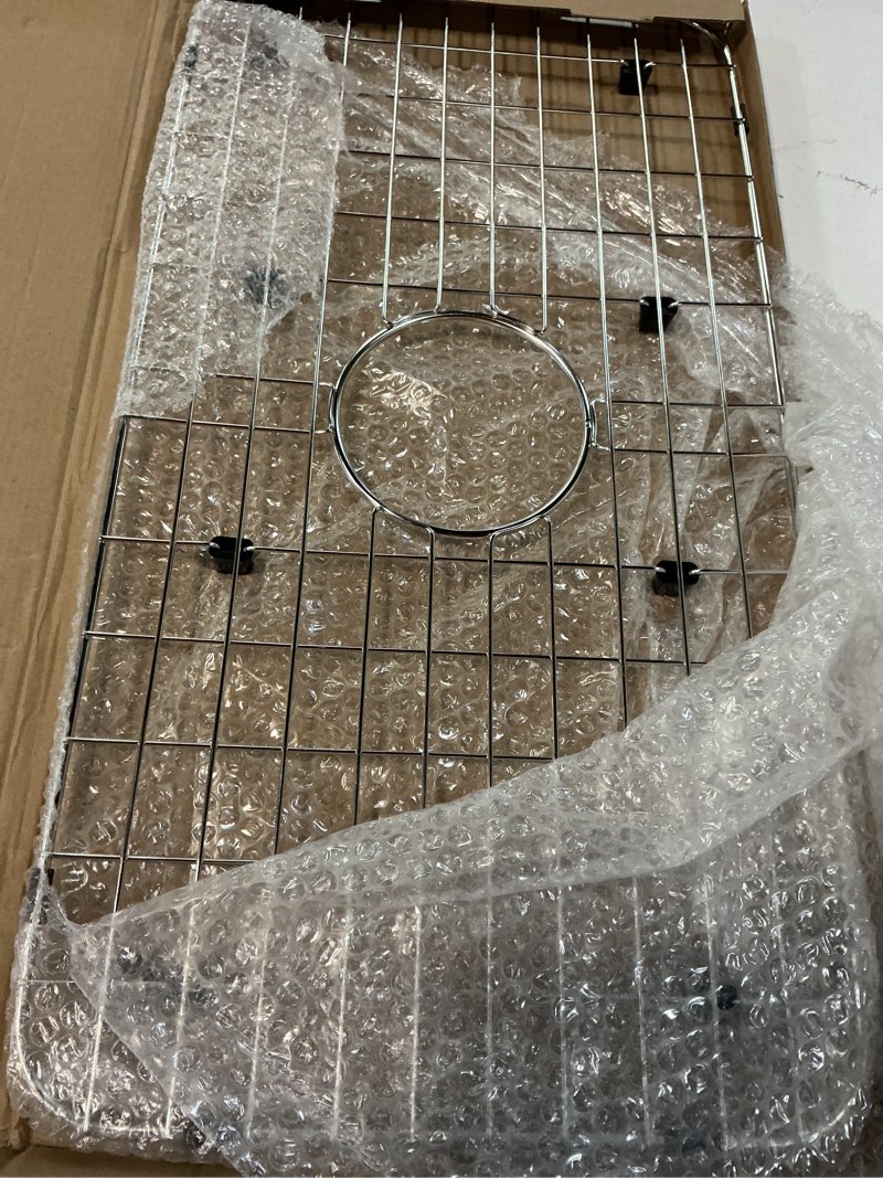Condition photo showing Good Condition for sink bottom grid 24-1/8" x 12-5/8", centered drain with corner radius 1-1/2", sink protector with rear drain for single sink bowl (24.1"w x 12.6"d x 1"h) 24-1/8" x 12-5/8" centered drain