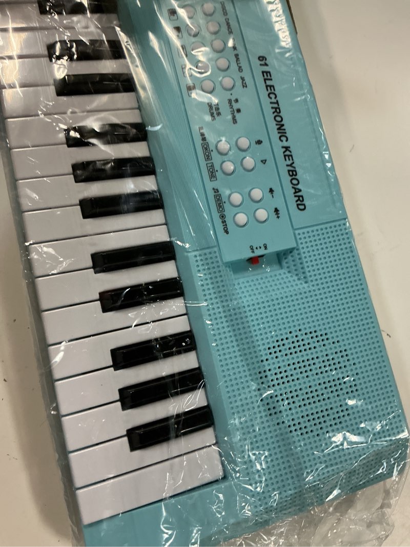 Condition photo showing New/Like New for raimy 61 key electric keyboard piano for kids with microphone | electric piano keyboard for beginners with microphone, sing along & record, birthday gift for boys and girls (light blue)